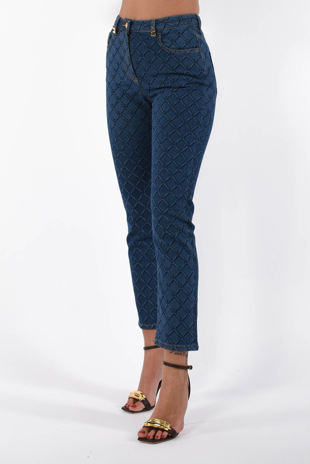 Jeans con losanghe all-over